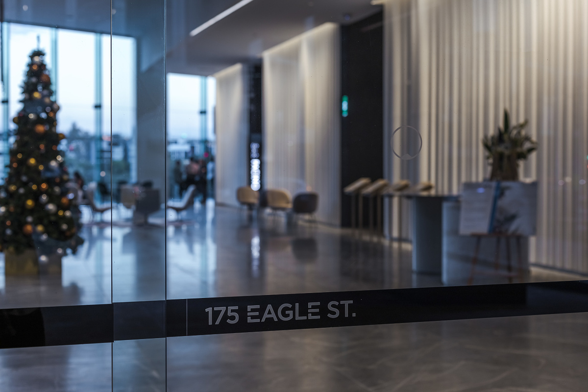 Lobby of 175 Eagle Street office building featuring ERCO lighting.