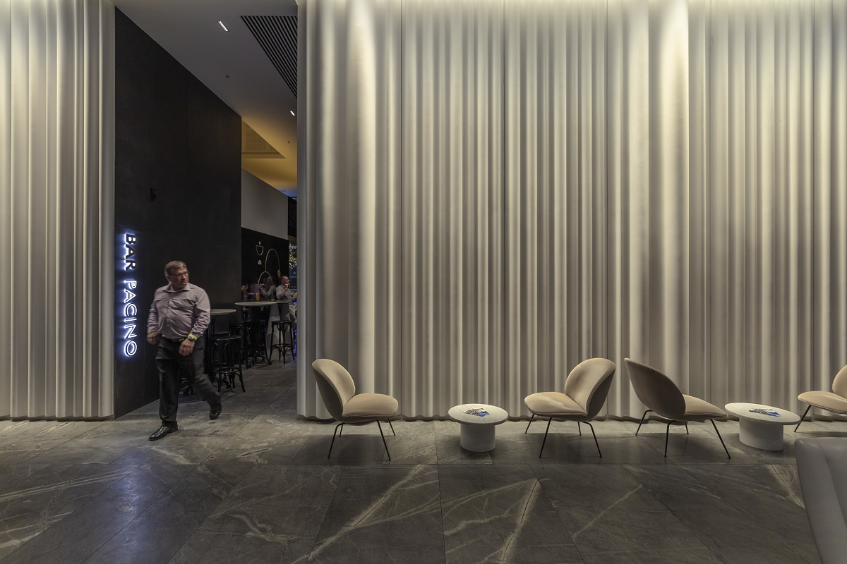 Homogeneous wallwashing with grazing light in the foyer of 175 Eagle Street office building, Brisbane.