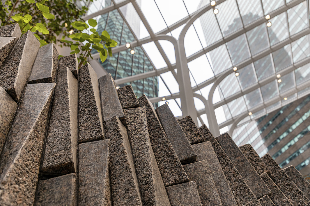 Kona outdoor projectors at 550 Madison Avenue Garden, NYC, for optimal plant growth and visual comfort.