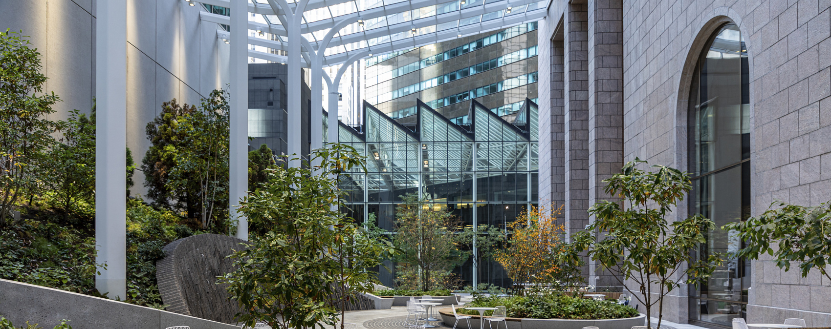 550 Madison Avenue Garden: Urban oasis featuring ERCO outdoor lighting for plant growth and visual comfort.