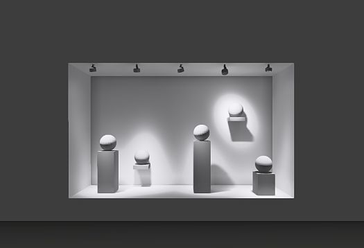 ERCO lighting: Display featuring LED spotlights accentuating spherical objects.