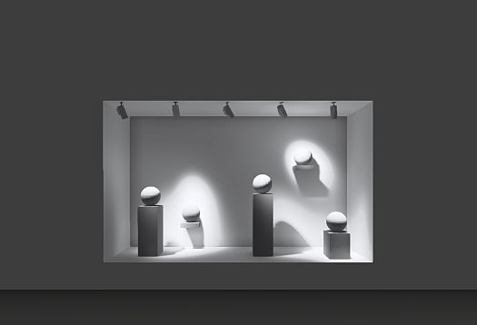 ERCO lighting: Spherical objects accented by lens spotlights in a display.