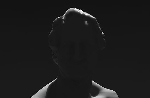Accent lighting on a sculpture, demonstrating modelling through light and shadow.