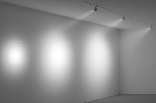 ERCO track spotlights providing accent lighting, creating light accents on a wall.