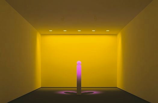 Accent lighting highlights an object in a yellow room, demonstrating light modelling.