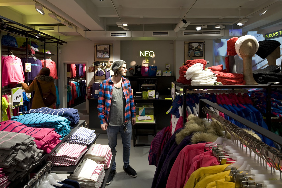 Adidas NEO store in Cologne featuring LED lighting and young fashion.