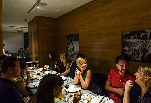 Diners enjoy ERCO lighting at Ambiente Brasileiro restaurant in Prague.