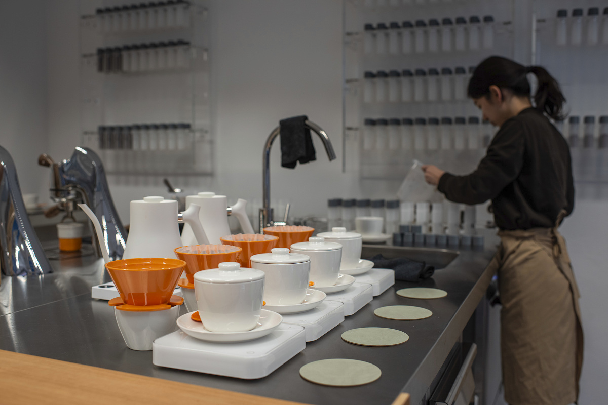 April Coffee Roasters prep area illuminated by flexible ERCO Jilly downlights.