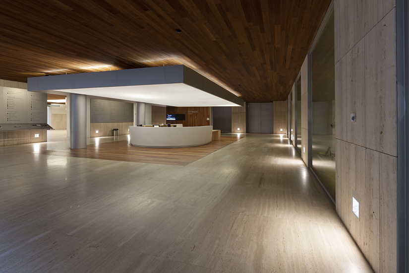Reception area at the Archaeological Museum in Madrid, featuring ERCO lighting.