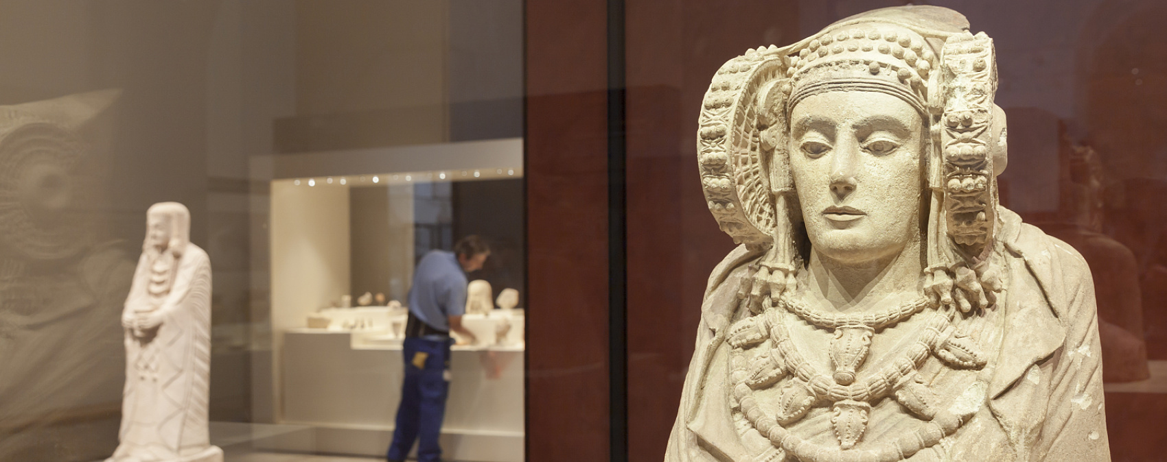 The Lady of Elche, a masterpiece of Iberian art, illuminated at the Archaeological Museum, Madrid.