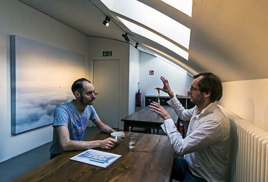 Archimedes agency offices in Berlin, featuring ERCO lighting solutions for meetings.
