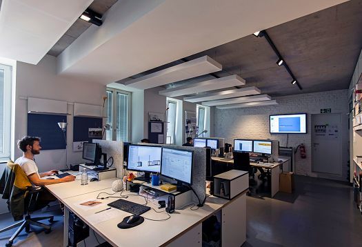 Archimedes agency offices in Berlin featuring ERCO lighting for modern workspaces and flexible office layouts.