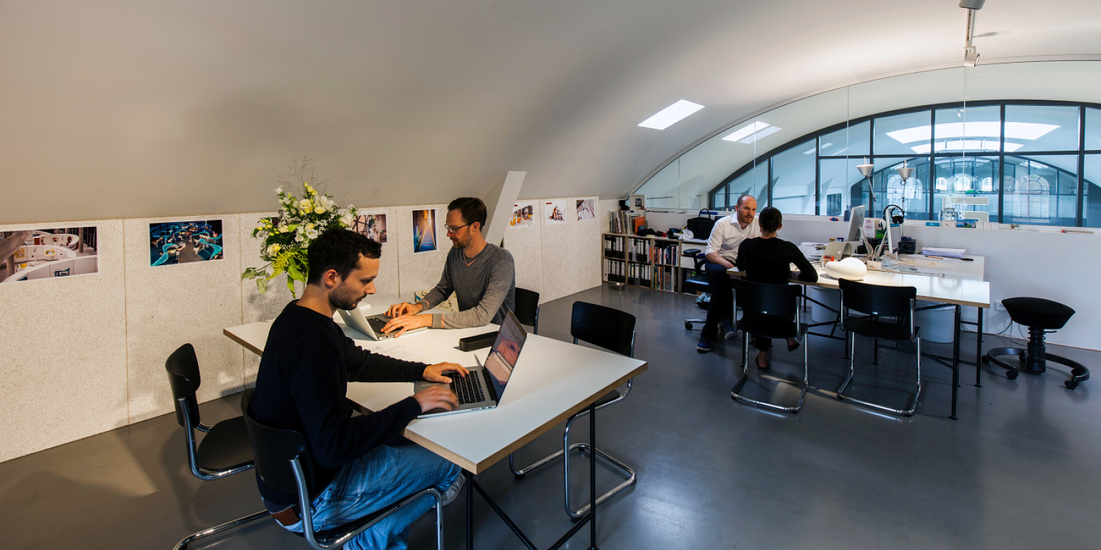 Archimedes agency offices in Berlin using ERCO lighting tools for exhibitions and brand spaces.