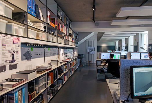 Archimedes agency offices in Berlin, featuring ERCO lighting for exhibitions and interactive installations.