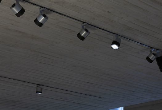 ERCO Parscan LED spotlights on a track, providing flexible exhibit lighting in Blockhaus Dresden.