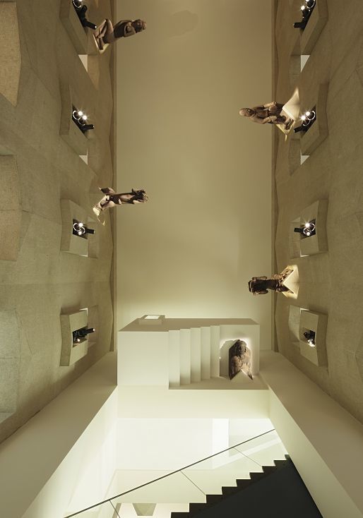Augustinian Museum: Illuminated sculptures in remodeled monastery church with ERCO spotlights.