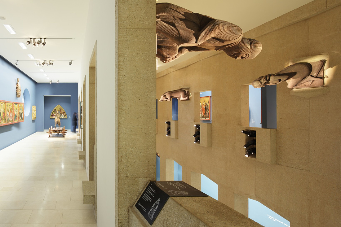 Augustinian Museum: Illuminated sculptures and art in the remodeled monastery, featuring ERCO spotlights.