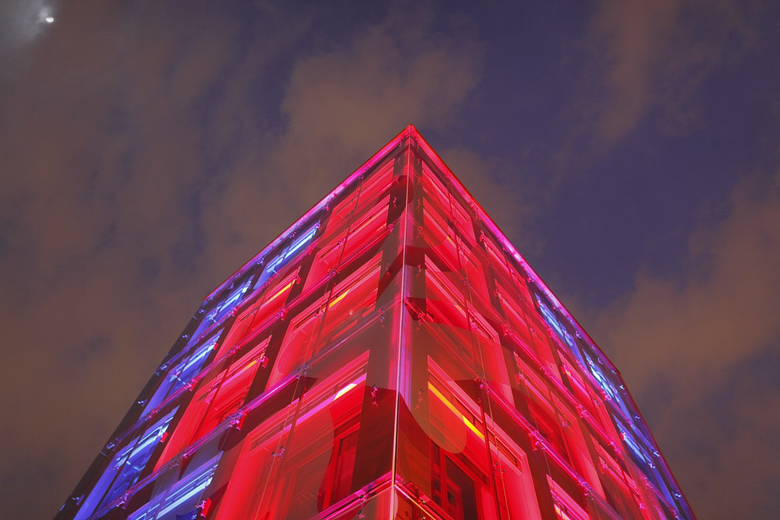 Banca Farnese illuminated with colored LEDs using Focalflood facade floodlights.