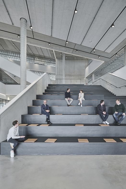 ERCO track lighting solution at Baramundi Software AG, Augsburg, for flexible office areas and high spaces.