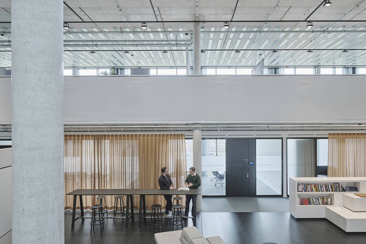 ERCO track lighting with Skim downlights and Logotec spotlights at Baramundi Software AG, Augsburg.