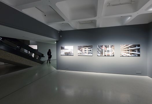 LED lighting at the Barbican Centre, London, highlighting the Brutalist architecture and art exhibition.