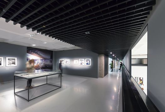 ERCO LED lighting in the Barbican Art Gallery, London. Modern lighting in Brutalist architecture.