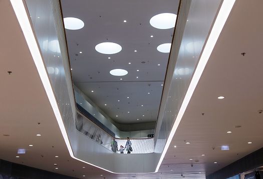 Bory Mall in Bratislava featuring ERCO Skim downlights creating a starry sky atmosphere.