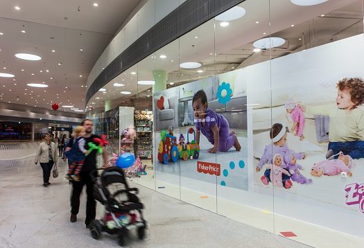 Bory Mall storefront featuring Fisher-Price ads and ERCO Skim downlights.