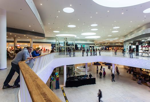 Interior of Bory Mall in Bratislava, featuring ERCO Skim downlights for pleasant illumination.