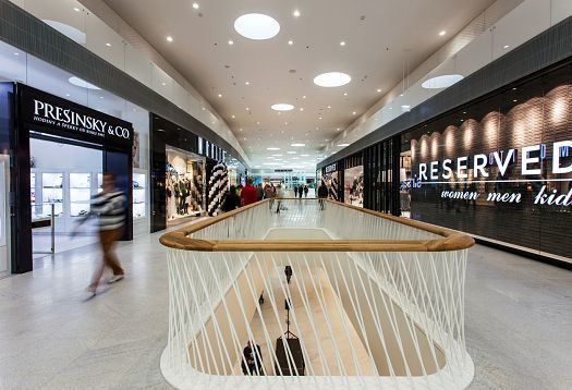 Interior of Bory Mall in Bratislava featuring ERCO Skim downlights for pleasant shopping ambience.