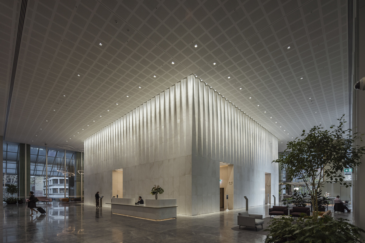Bourke Place Lobby in Melbourne, featuring ERCO Gimbal recessed spotlights for wallwashing.