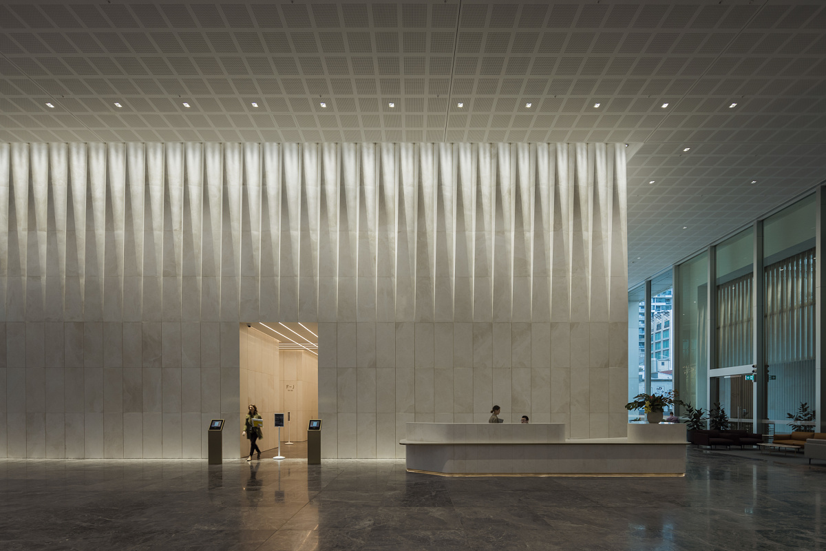 Bourke Place Lobby in Melbourne featuring ERCO Gimbal recessed spotlights for wallwashing.