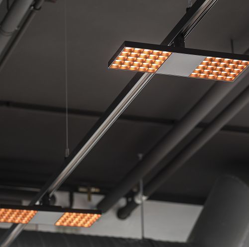 ERCO track-mounted lighting for flexible office environments.