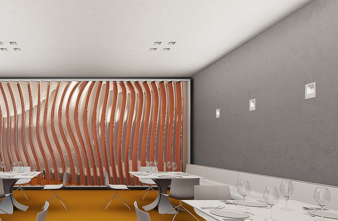 Restaurant interior featuring ERCO lighting, creating brilliance and atmosphere.