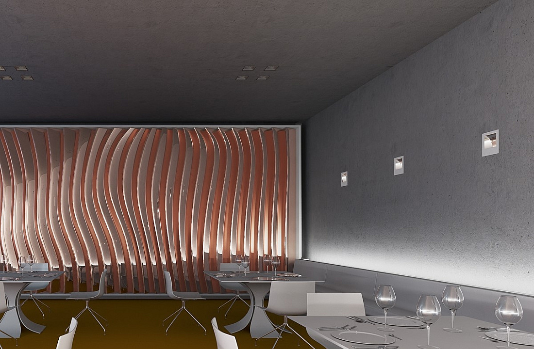 Restaurant interior featuring ERCO lighting, enhancing brilliance and atmosphere.