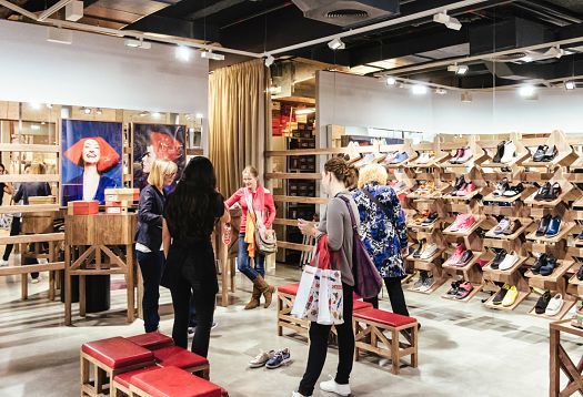 Interior of the Camper shoe store in Barcelona, featuring ERCO LED lighting.