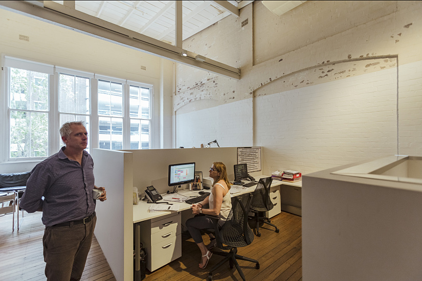 Candalepas Associates' Sydney office featuring ERCO lighting for effective and pleasing illumination.