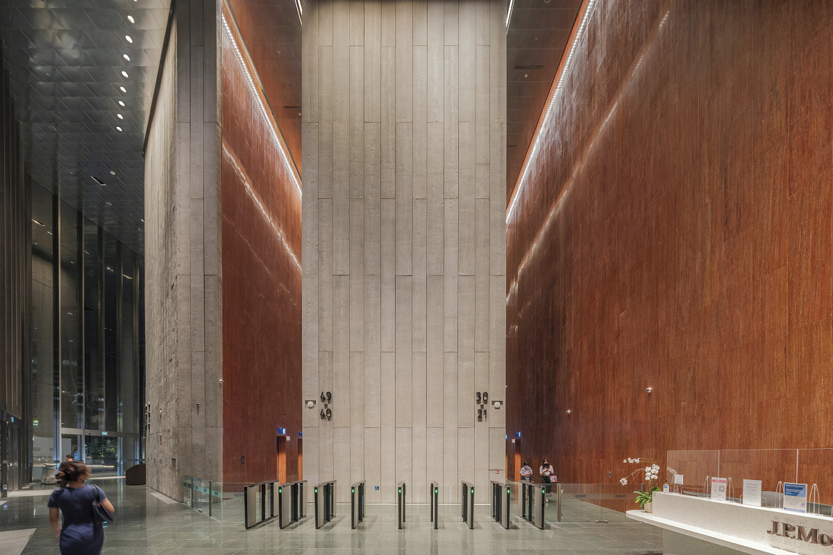 CapitaSpring building lobby in Singapore, featuring ERCO lighting for visual comfort.