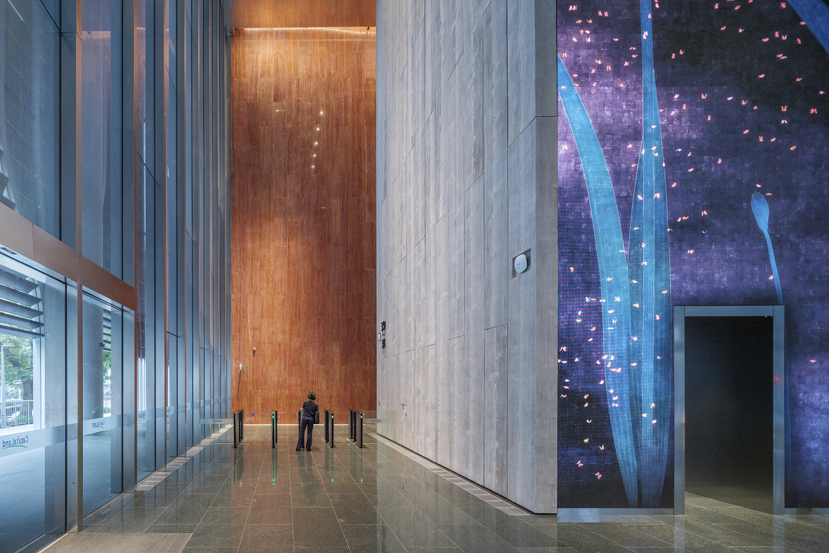 CapitaSpring building lobby in Singapore, featuring ERCO lighting for visual comfort.