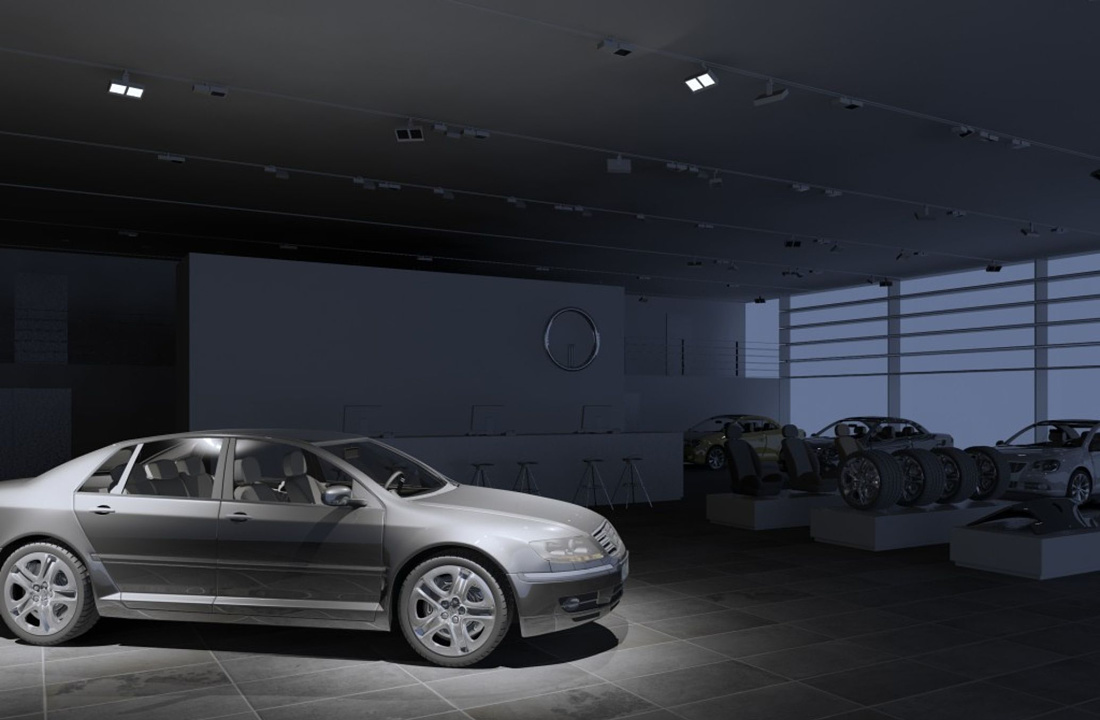 Car in a dealership illuminated by ERCO spotlights for high-quality presentation.