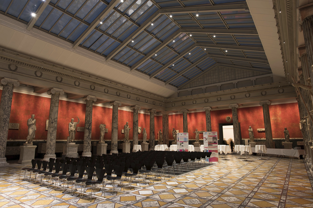 Carlsberg Glyptotek in Copenhagen, featuring ERCO track spotlights for exhibition lighting.