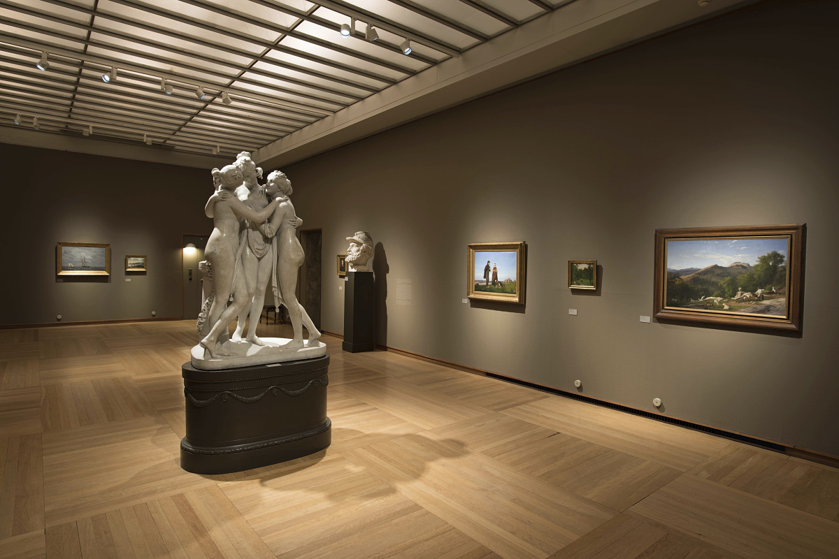 Three Graces sculpture in Glyptoteket museum, lit by ERCO track spotlights.