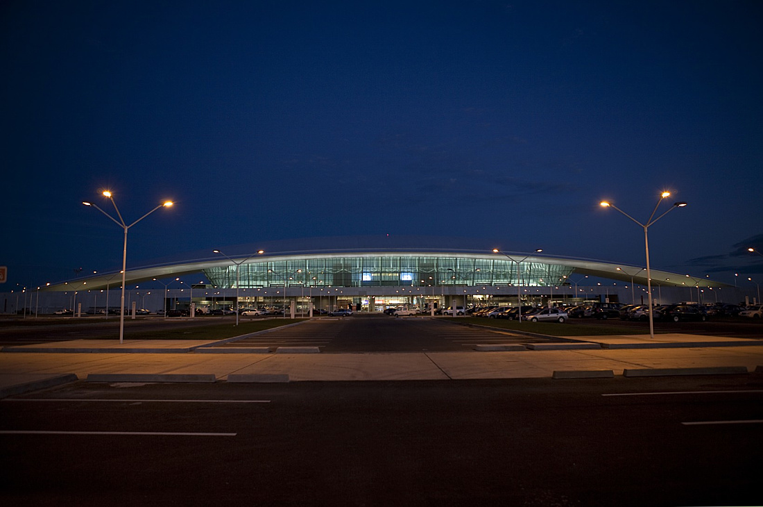 Carrasco International Airport illuminated at night with ERCO lighting.