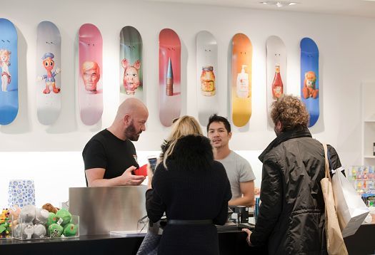 Colette store in Paris, featuring ERCO LED lighting and skateboard art.