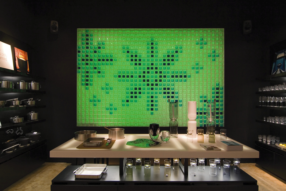 Iittala Flagship Store showcasing green color effect with ERCO lighting.