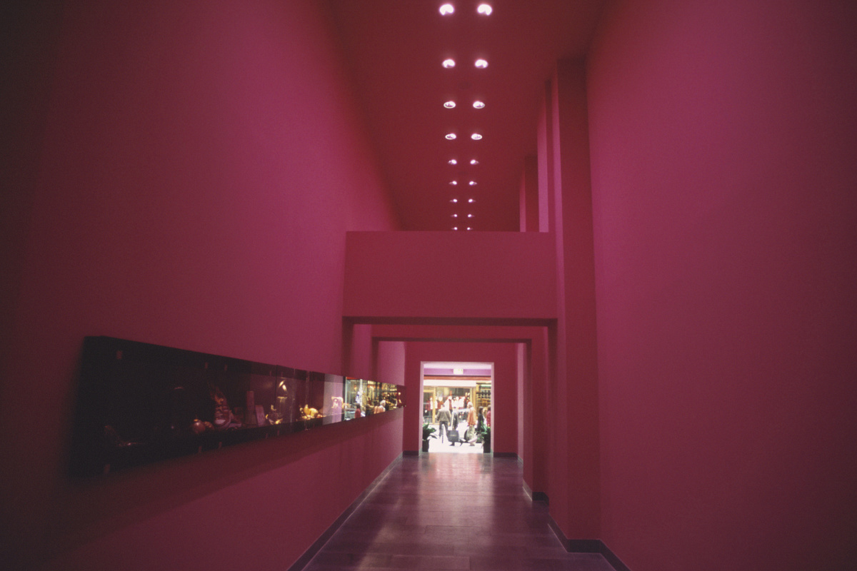 Architectural space with red lighting, demonstrating color mixing.