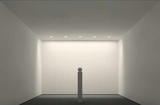 ERCO lighting: Illuminated gallery space featuring downlights and sculpture.