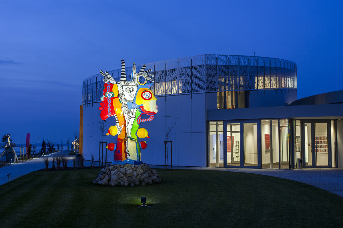 Colorful sculpture in front of the Danubiana Meulensteen Art Museum, Bratislava. Contrast of art and architecture.
