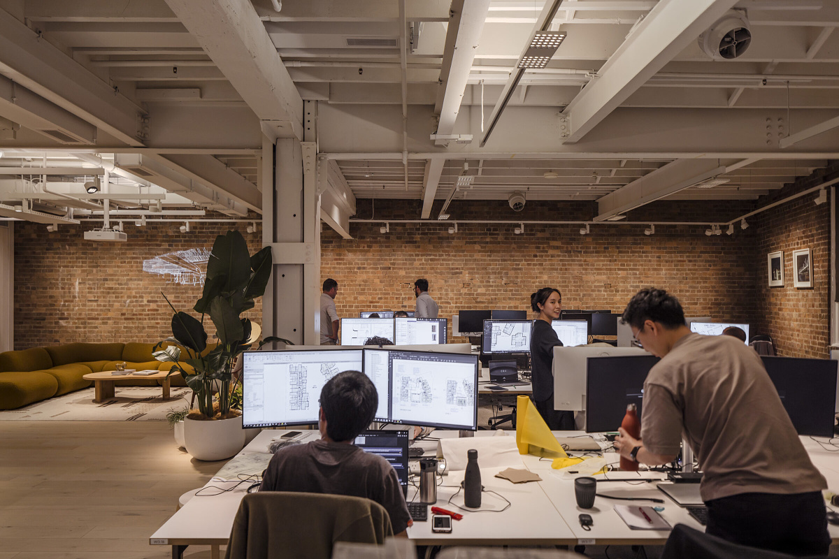 ERCO Jilly downlights illuminate workstations in the Cox Architecture office, Sydney.