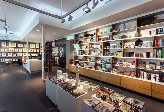 ERCO lighting in the Danubiana Museum shop, Bratislava. Accent lighting on shelves and products.